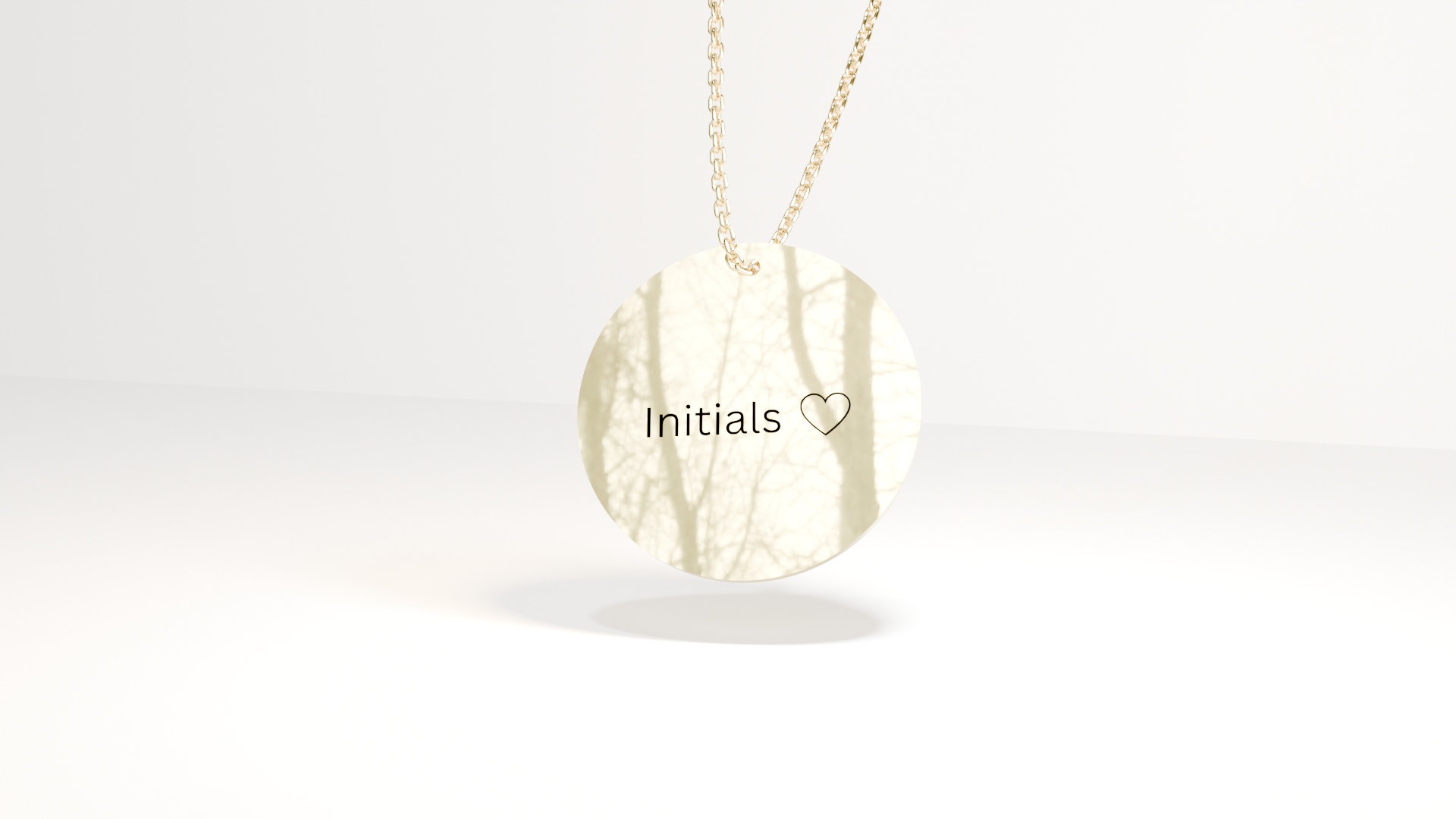 Luna Edition gold necklace with a pendant engraved 'Initials' on a white background