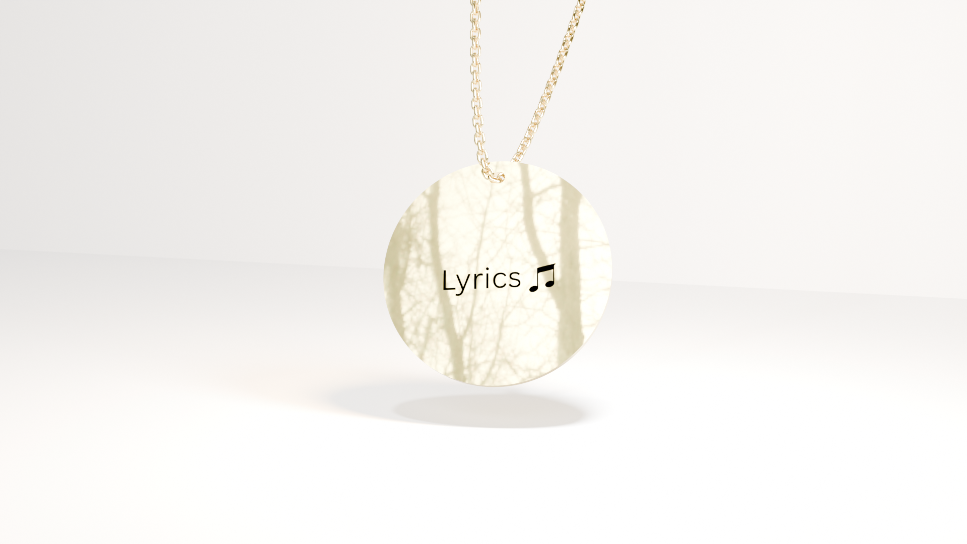 Gold necklace with a pendant labeled 'Lyrics' on a white background